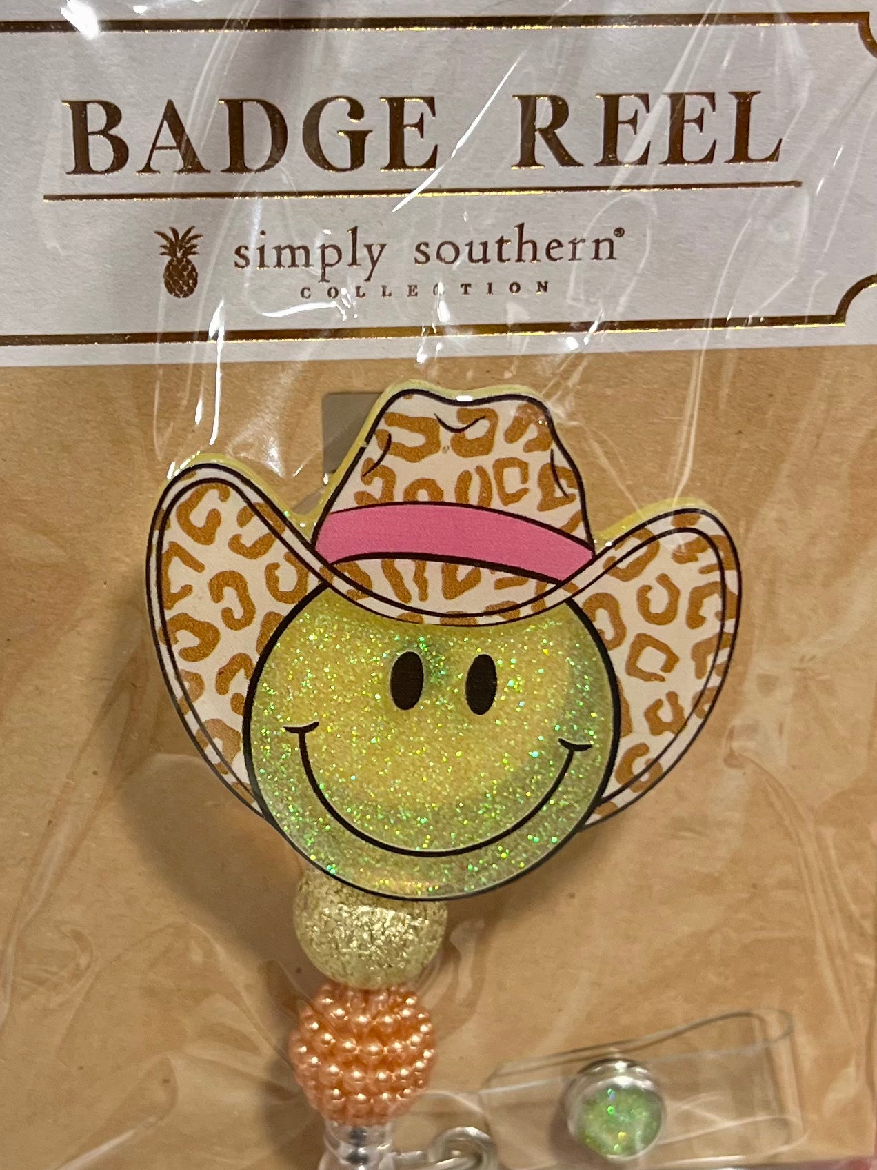 COWBOY SMILEY BADGE REEL