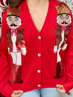 RED NUTCRACKER IN LEOPARD CARDIGAN