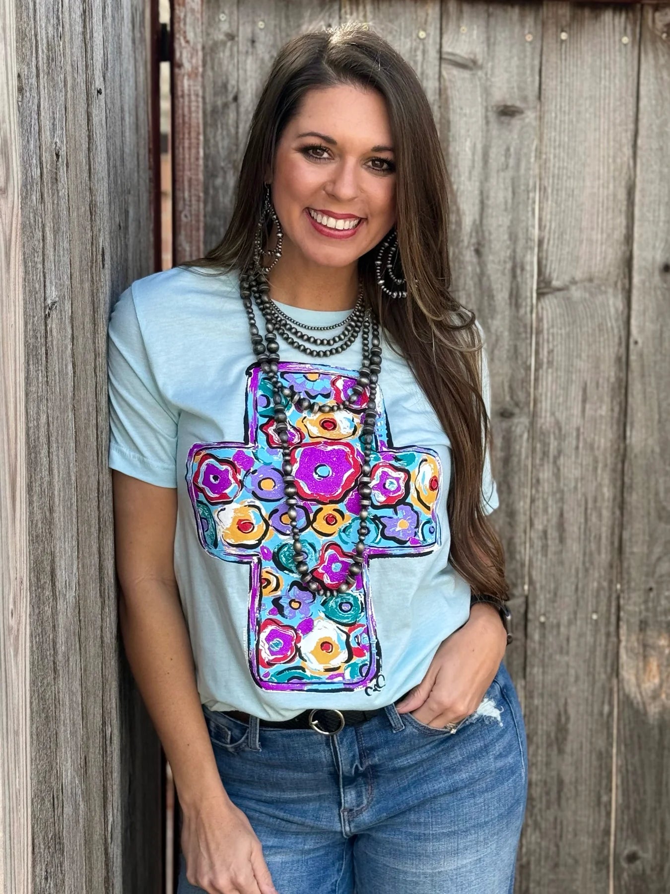 CALLIE ANN STELTER PURPLE FLORAL CROSS BABY BLUE TEE