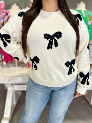 REMI BOW SWEATER