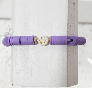 JANE MARIE PURPLE RUBBER SMILEY
