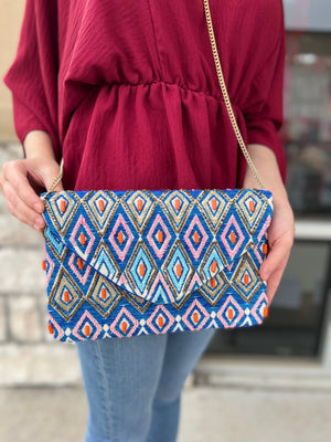 BLUE RHOMBUS SHAPE CLUTCH