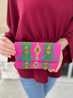 SMALL FUSCHIA CLUTCH