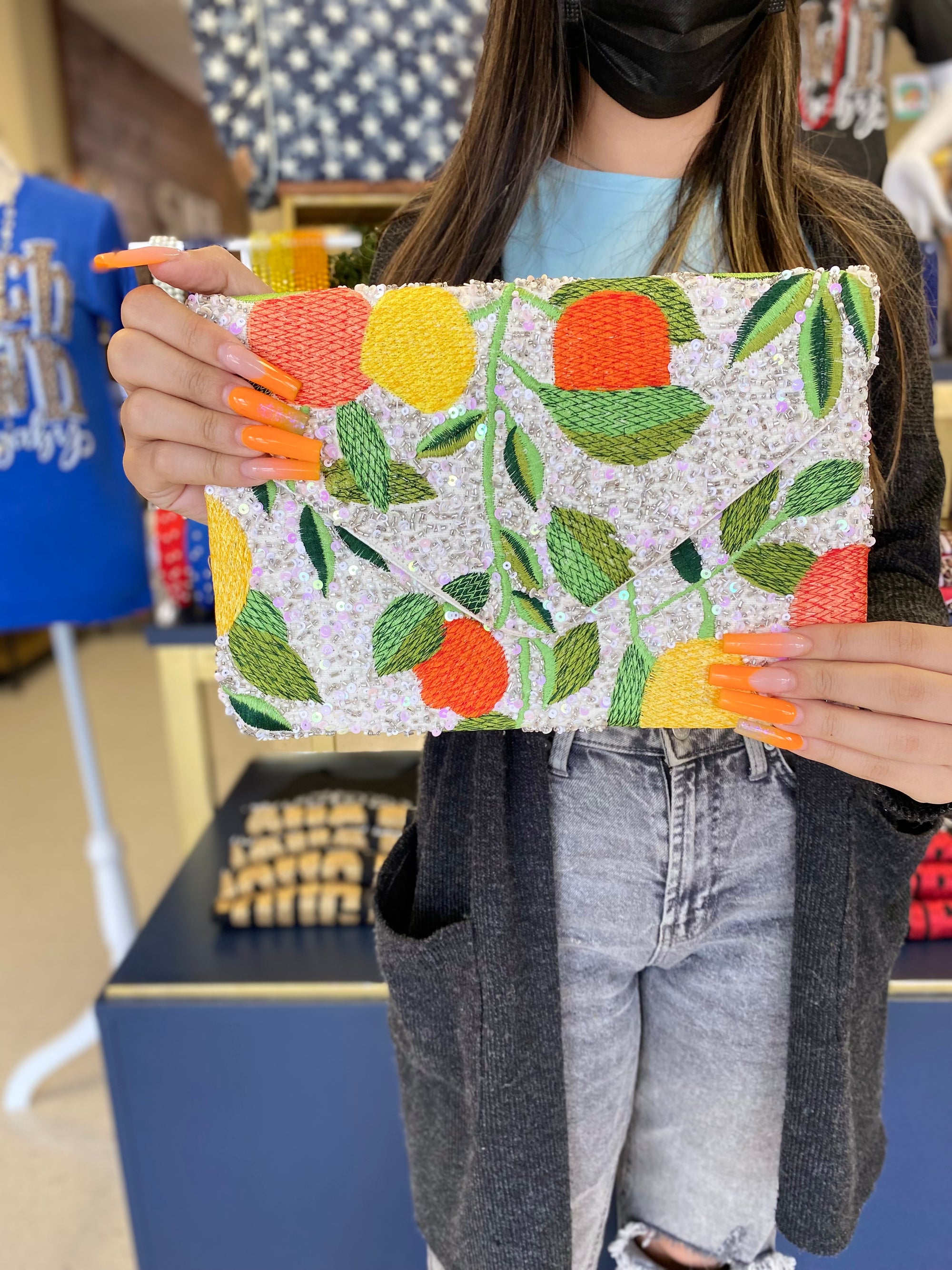 ORANGE/GREEN BLOOMS FLORAL CLUTCH