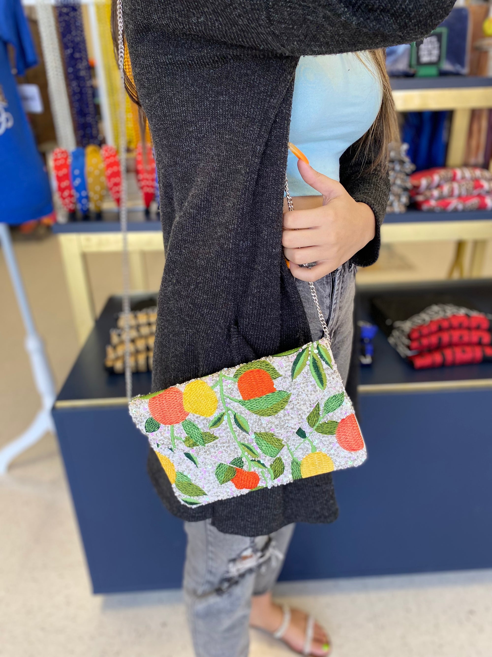 ORANGE/GREEN BLOOMS FLORAL CLUTCH