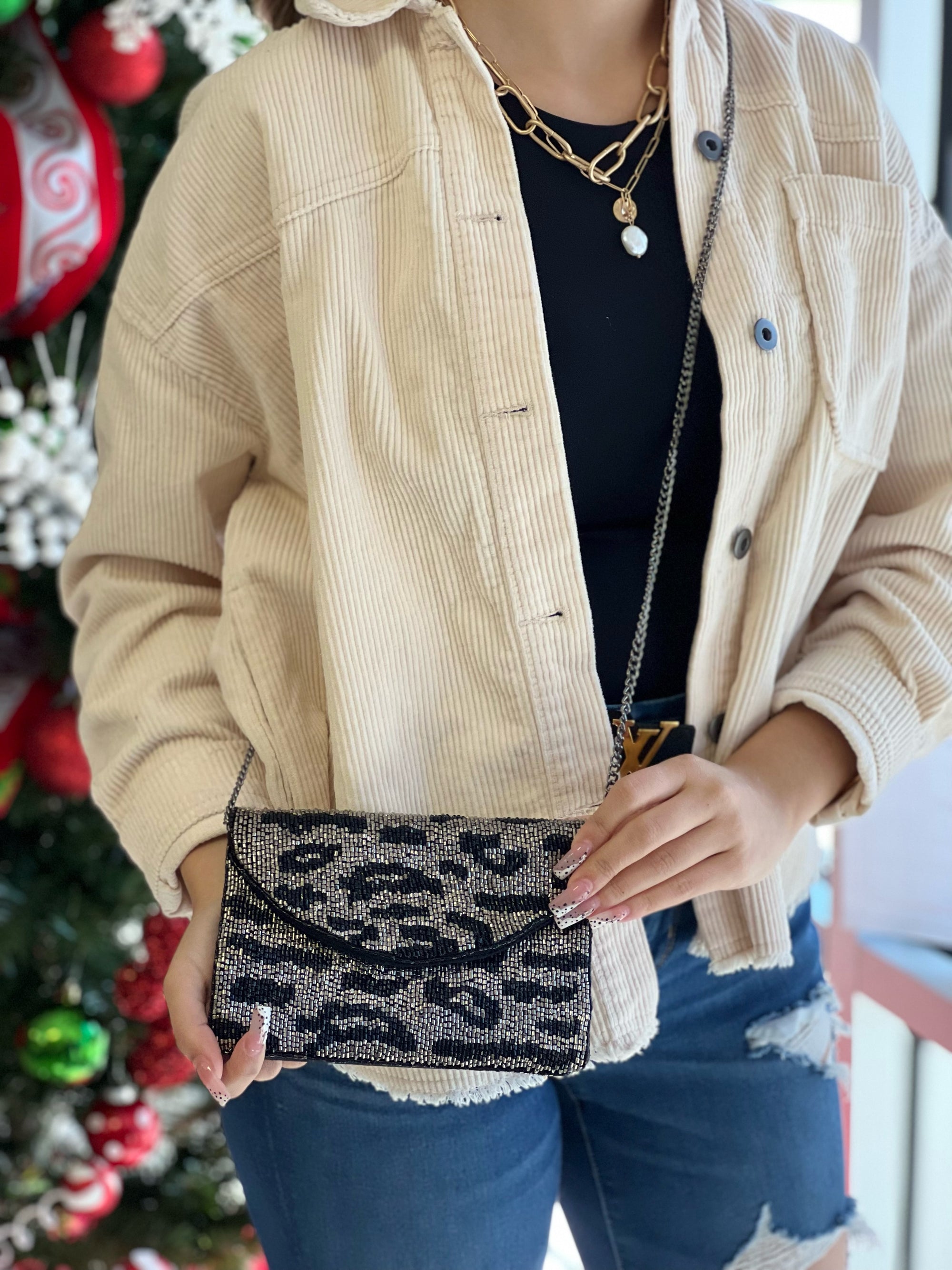 BLACK AND SILVER ANIMAL PRINT MINI CLUTCH