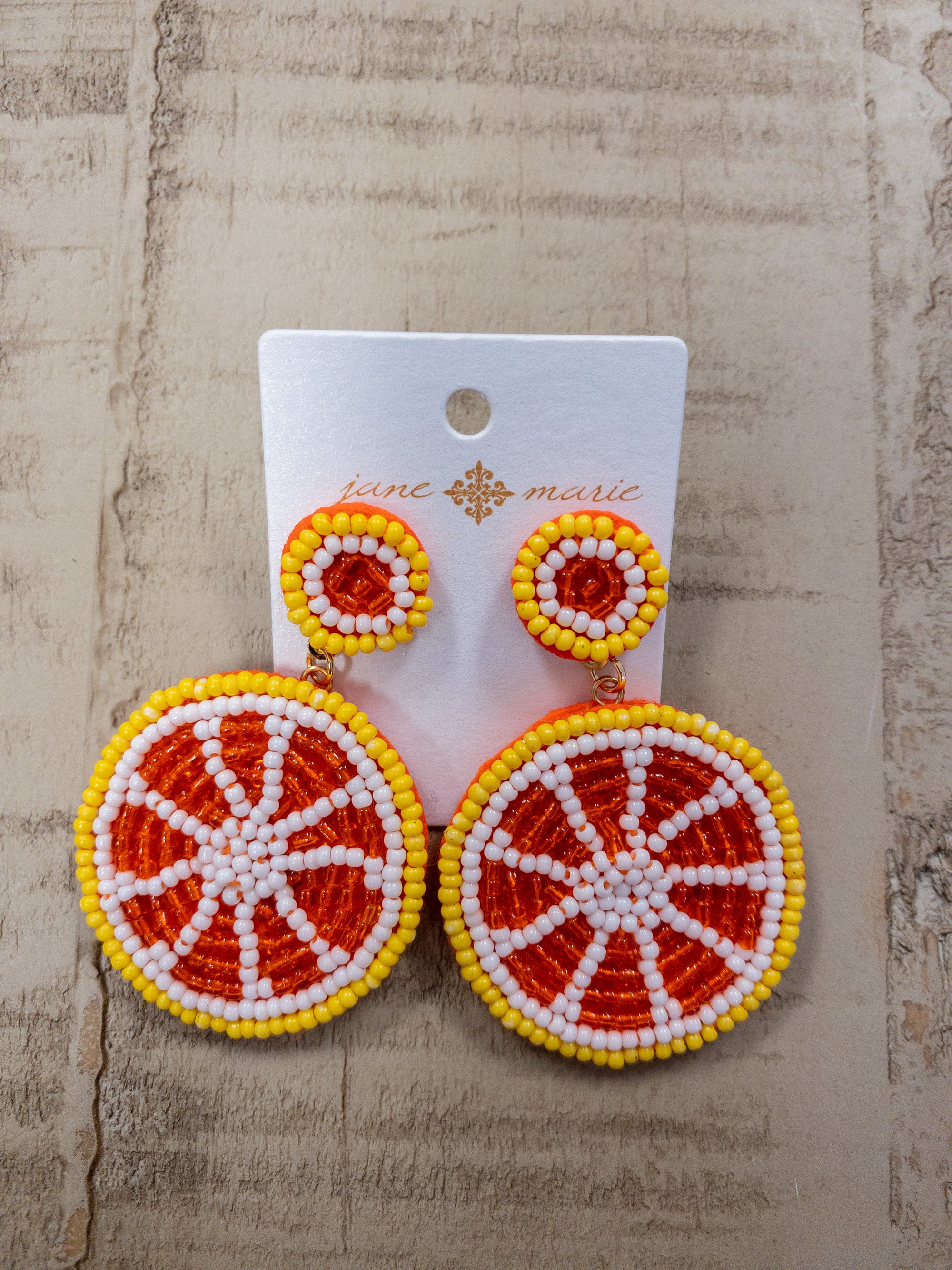 JANE MARIE GRAPEFRUIT POST EARRINGS.