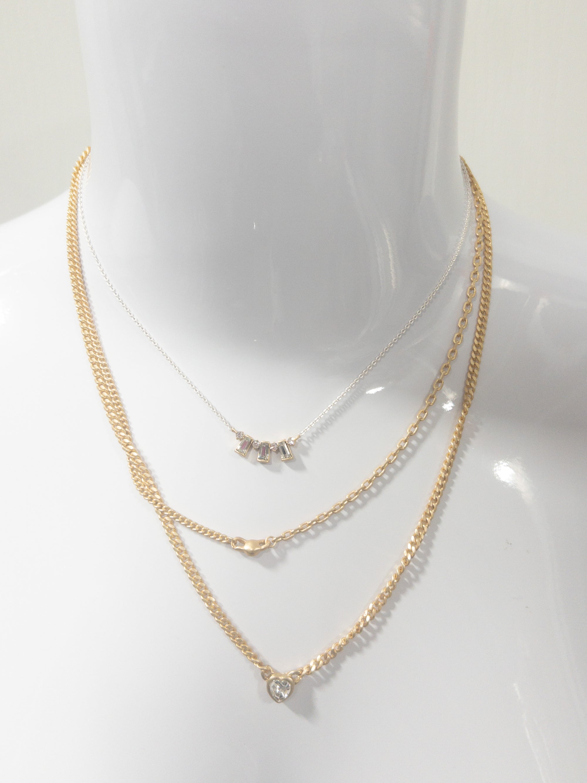 3 STRAND, CRYSTALS AND TRAPEZOID CRYSTALS CURVED BAR, CRYSTAL, GOLD CASED CRYSTAL HEART NECKLACE