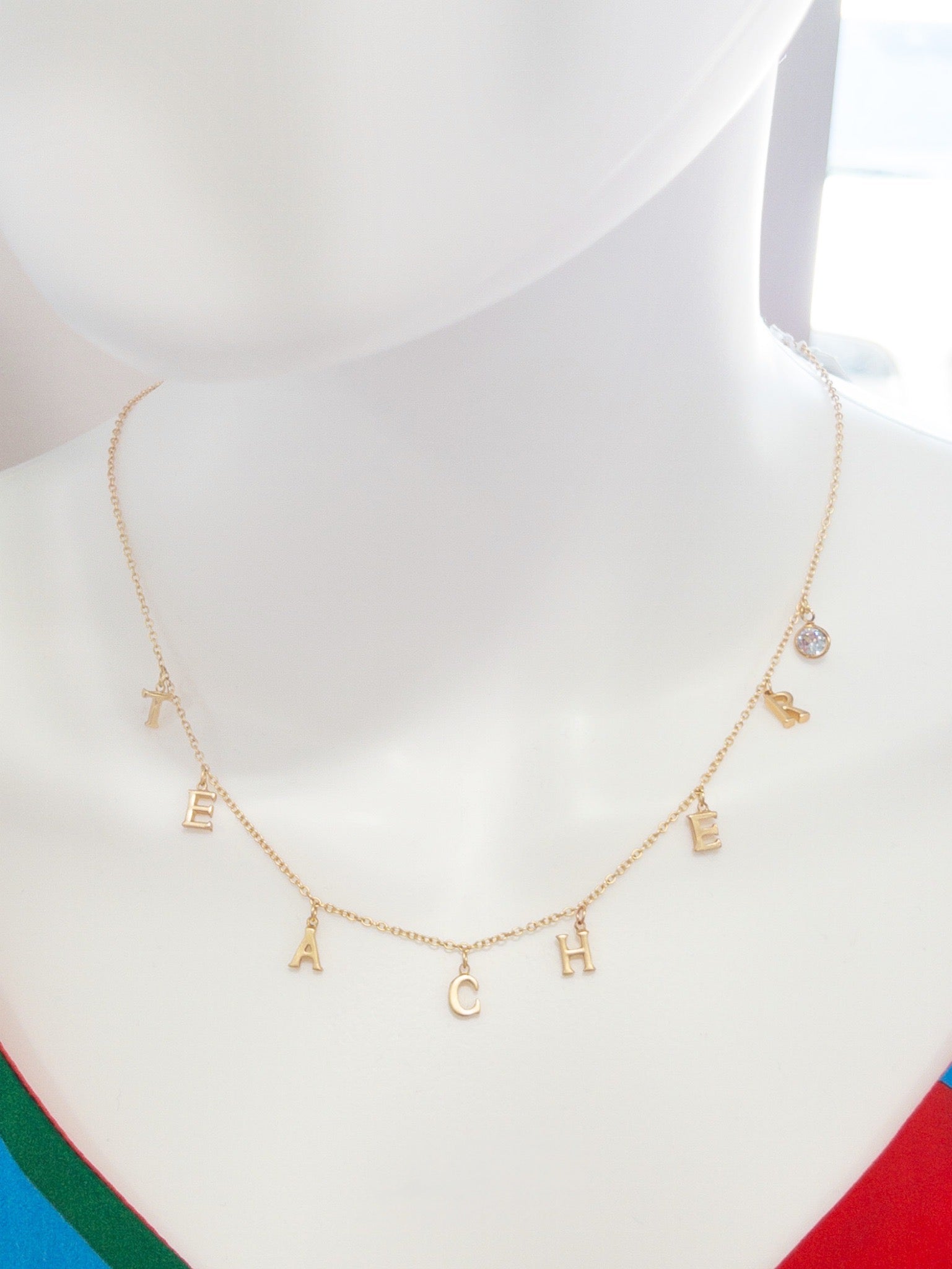 16" GOLD TEACHER WITH CLEAR CIRCLE CRYSTAL NECKLACE, 3" EXT.